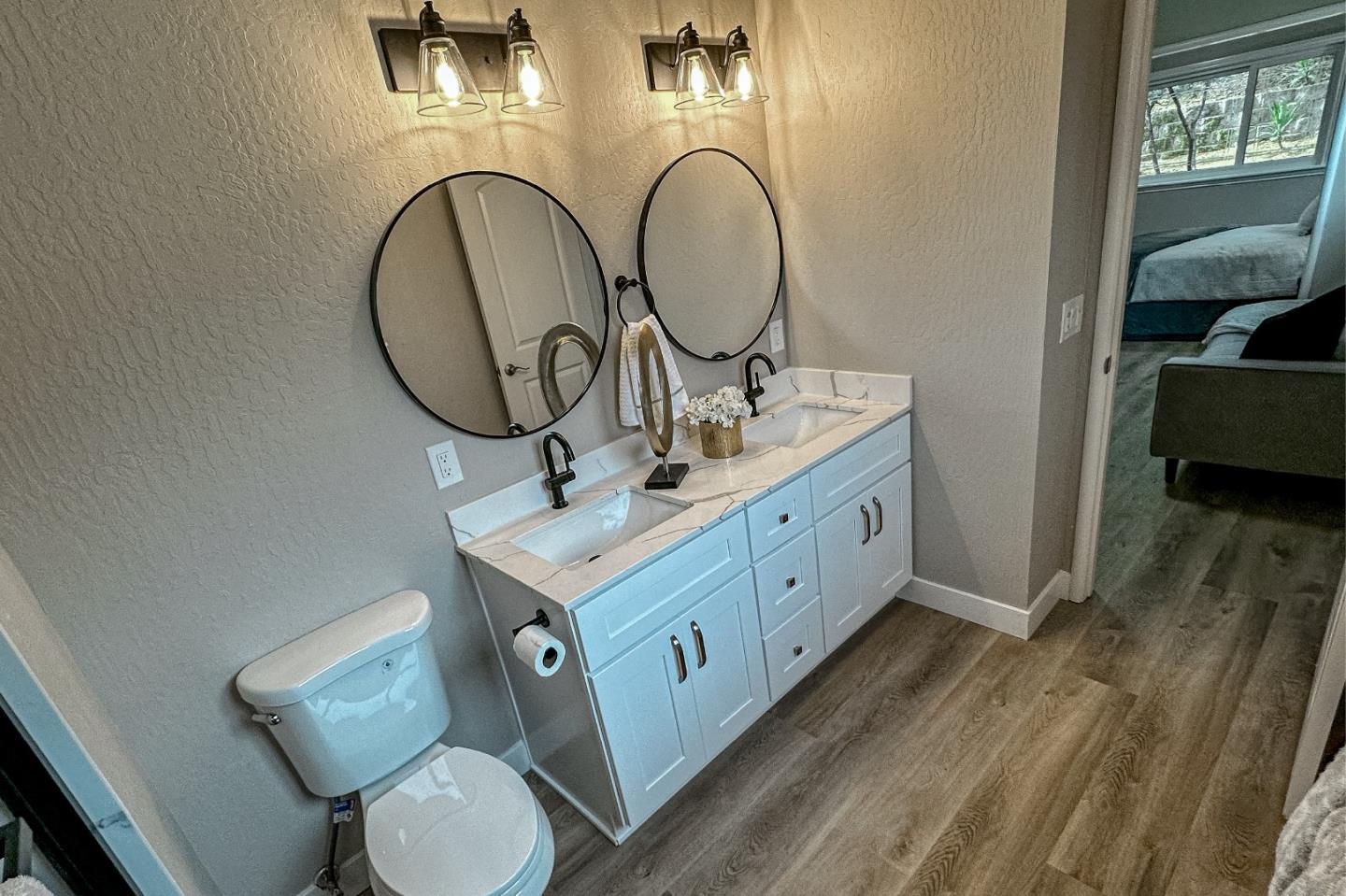 4030 St Marys Street Martinez, CA 94553 - Photo 17 of 28 a bathroom with 2 sink and a mirror