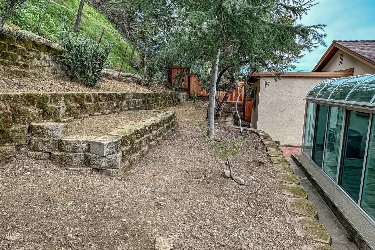 4030 St Marys Street Martinez, CA 94553 - Photo 25 of 28 a view of a house with a yard and wooden fence