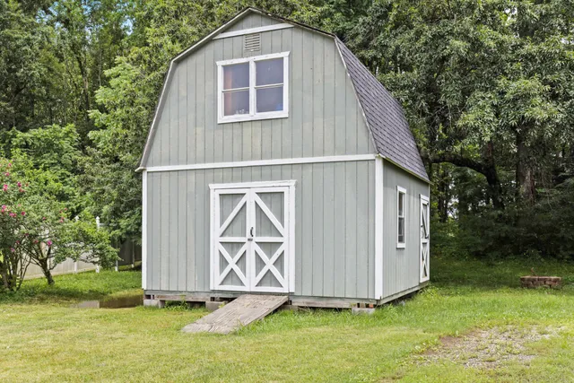 a view of backyard of house