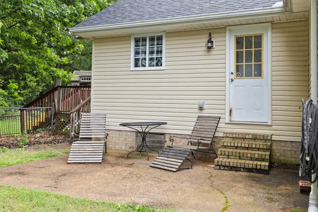 a view of a chairs with a back yard