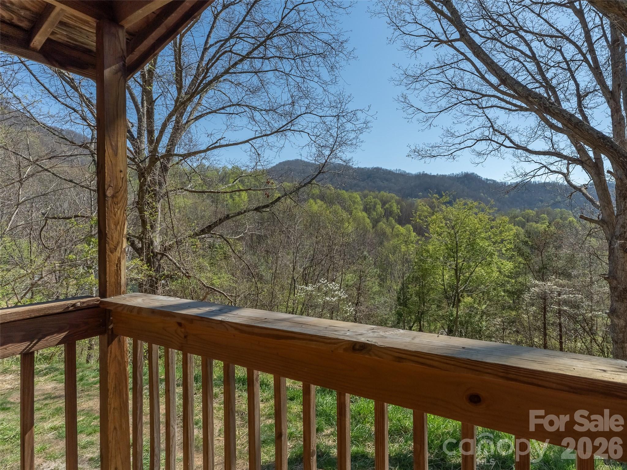 301 Matthew Lane Canton, NC 28716 - Photo 22 of 29 a view of a wooden fence and a yard