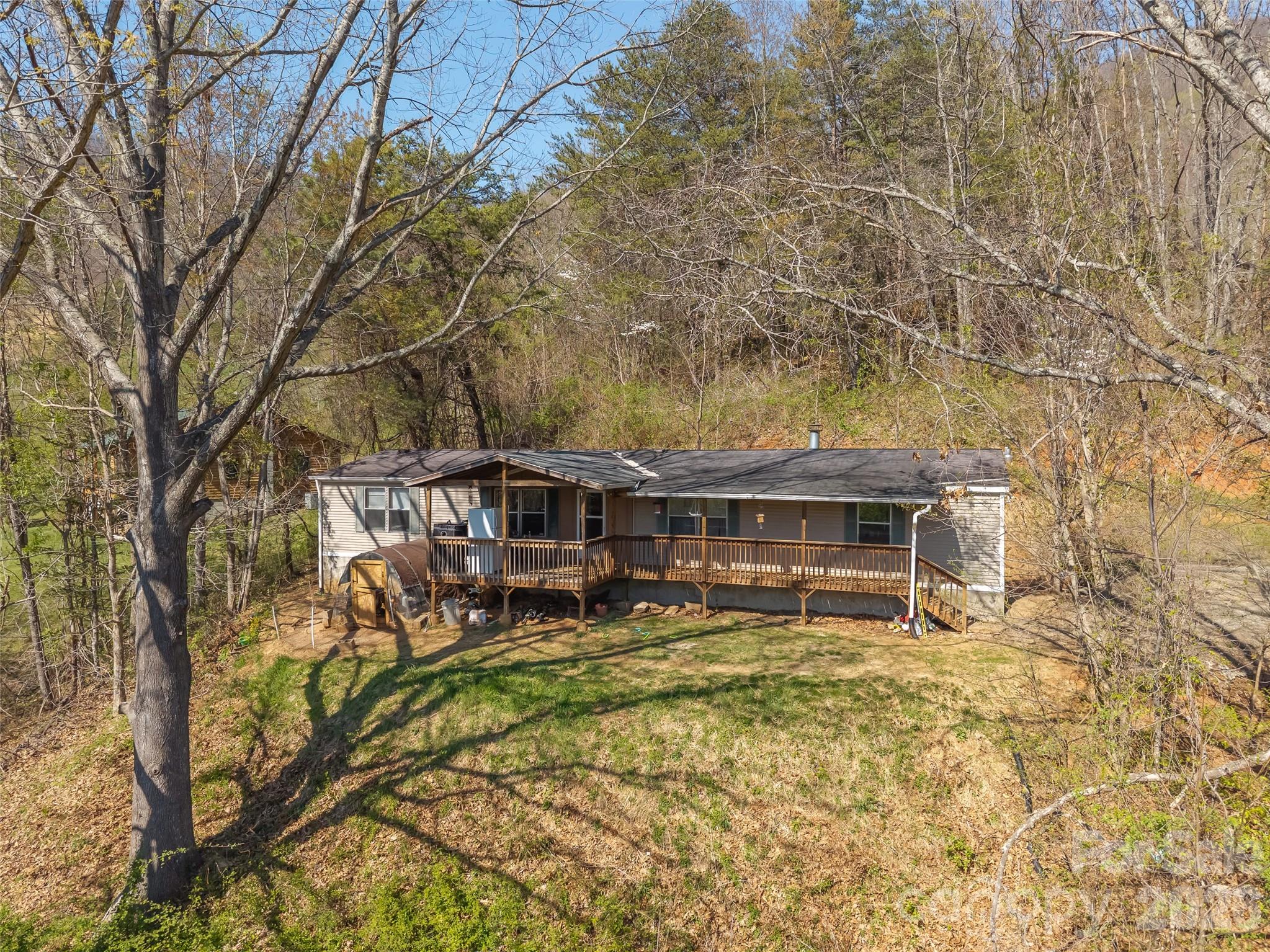 301 Matthew Lane Canton, NC 28716 - Photo 24 of 29 front view of a house with a yard