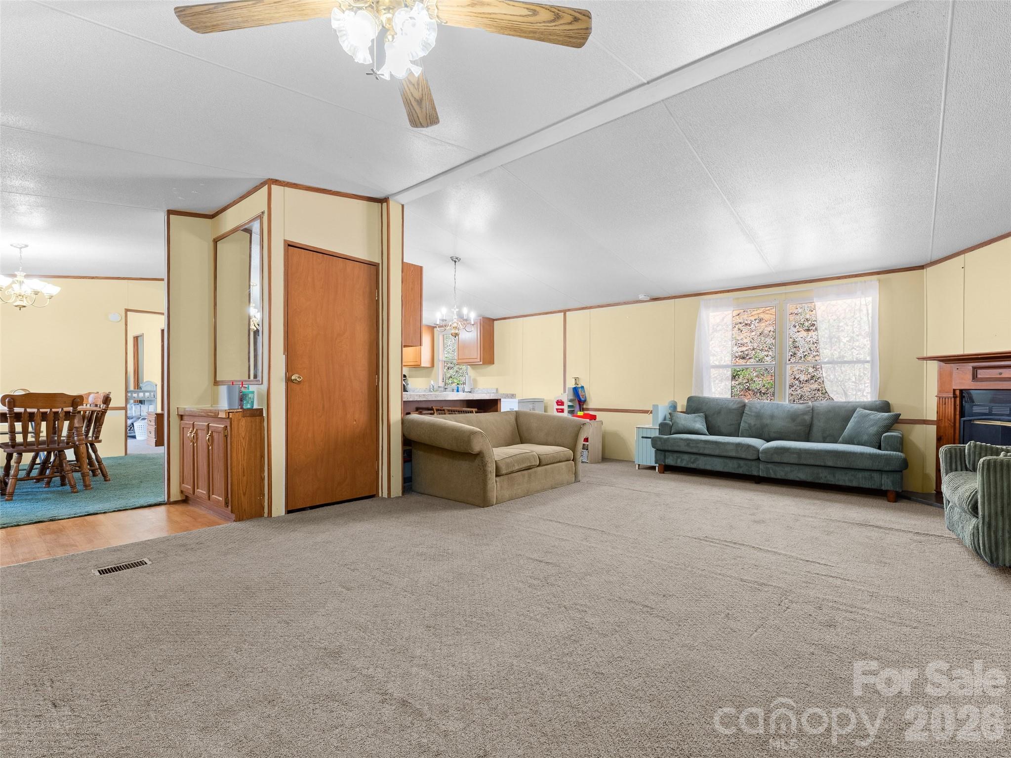 301 Matthew Lane Canton, NC 28716 - Photo 3 of 29 a living room with furniture and a large window