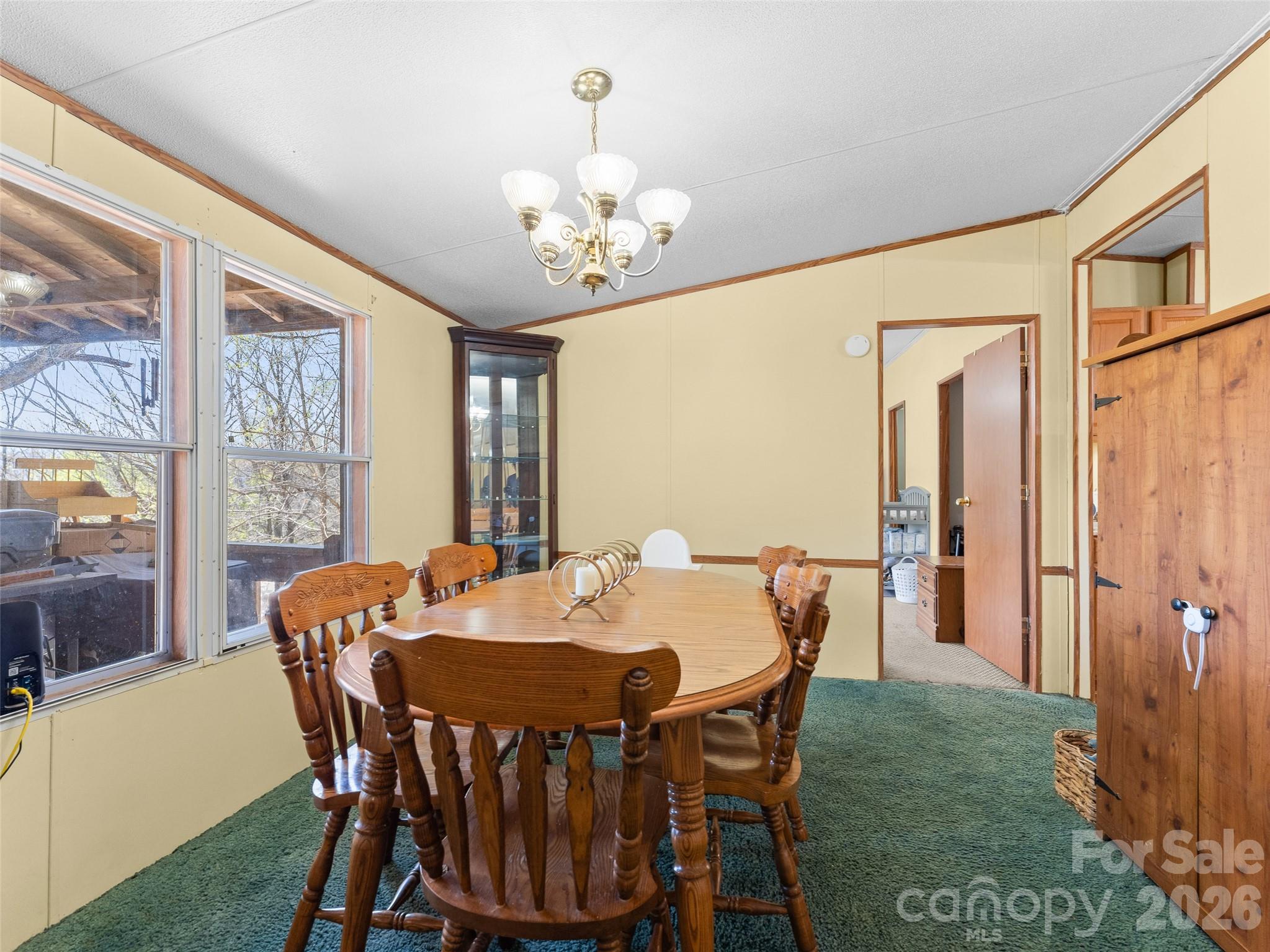301 Matthew Lane Canton, NC 28716 - Photo 9 of 29 a view of a dining room with furniture window and outside view