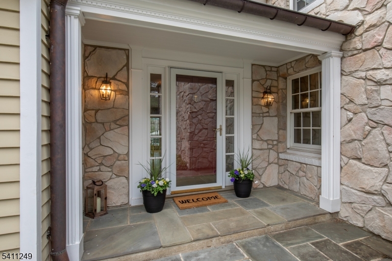 301 Hilltop Road Mendham, NJ 07945 - Photo 1 of 34 a view of a entryway door front of house