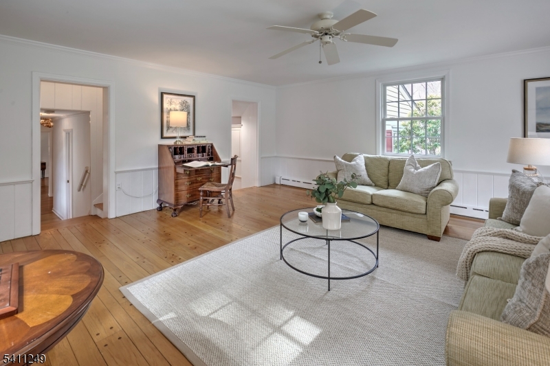 301 Hilltop Road Mendham, NJ 07945 - Photo 17 of 34 a living room with furniture or couch and a window