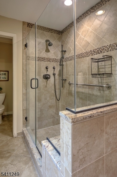 301 Hilltop Road Mendham, NJ 07945 - Photo 21 of 34 a bathroom with a shower