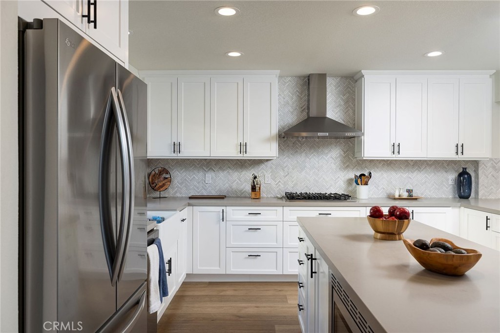 602 Calle Ganadero San Clemente, CA 92673 - Photo 11 of 42 a kitchen with stainless steel appliances granite countertop a refrigerator sink and stove