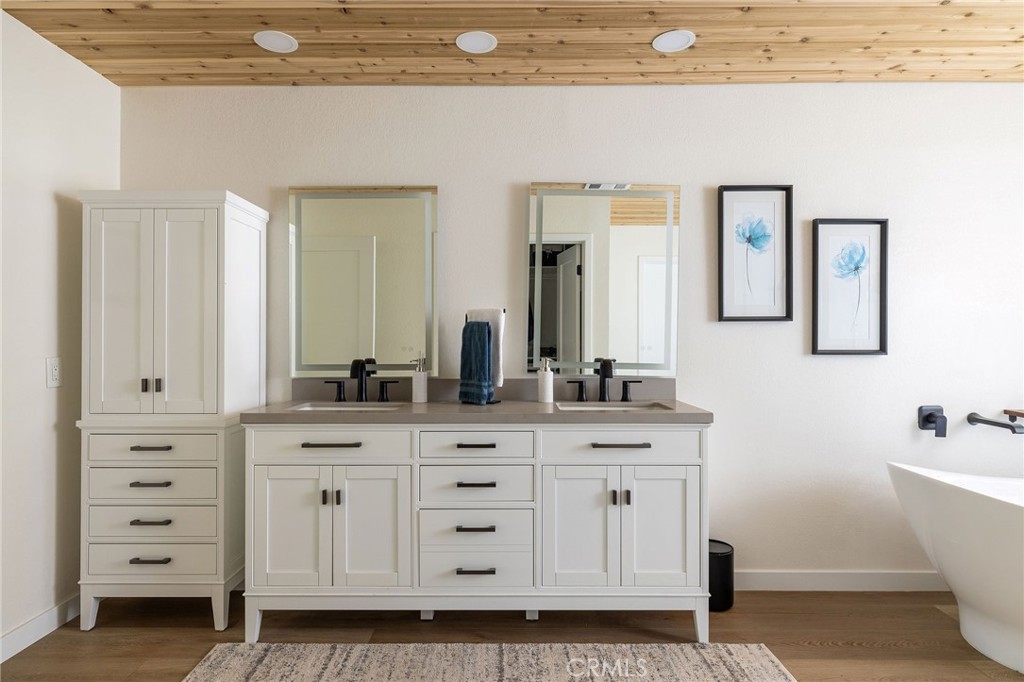 602 Calle Ganadero San Clemente, CA 92673 - Photo 22 of 42 a bathroom with a double vanity sink and mirror