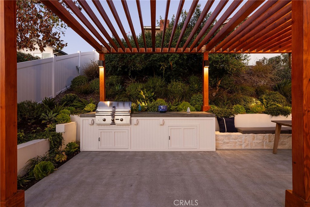 602 Calle Ganadero San Clemente, CA 92673 - Photo 35 of 42 a view of patio with a table and chairs and potted plants