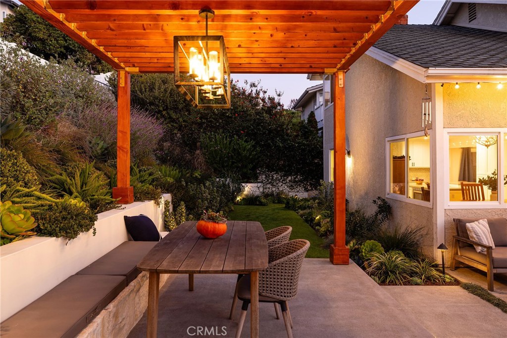 602 Calle Ganadero San Clemente, CA 92673 - Photo 38 of 42 a view of a patio with table and chairs and potted plants