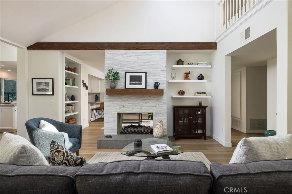 602 Calle Ganadero San Clemente, CA 92673 - Photo 4 of 42 a living room with furniture and a fireplace