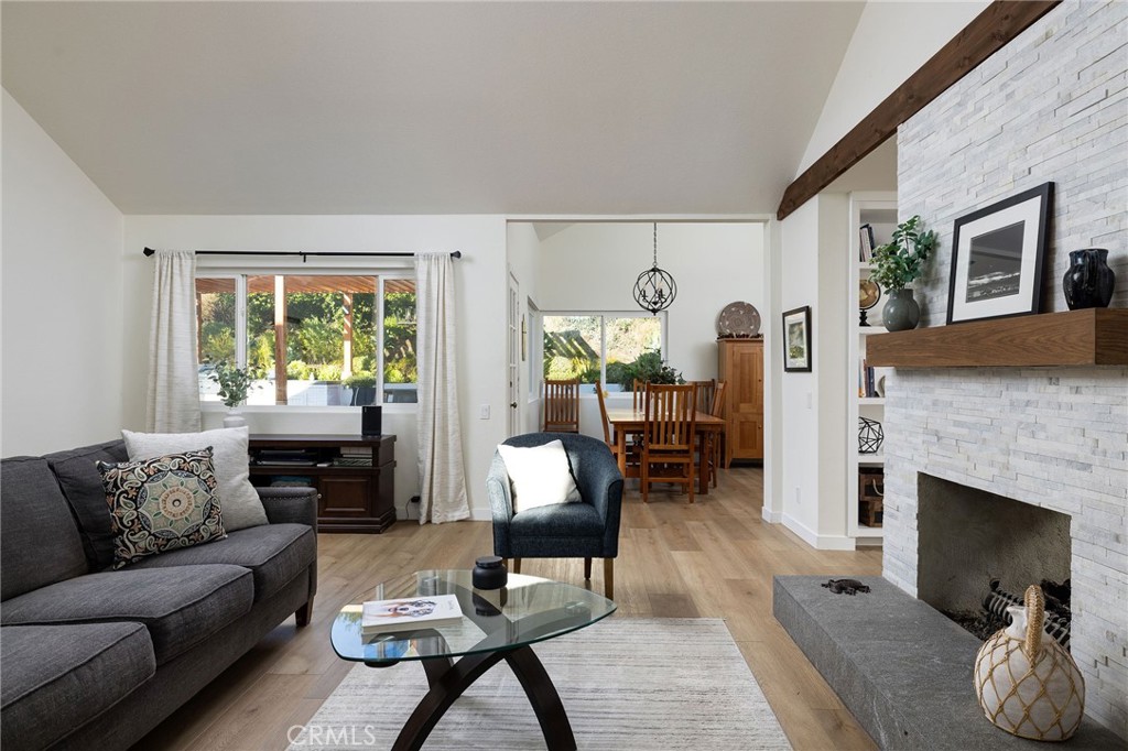 602 Calle Ganadero San Clemente, CA 92673 - Photo 6 of 42 a living room with furniture and a fireplace