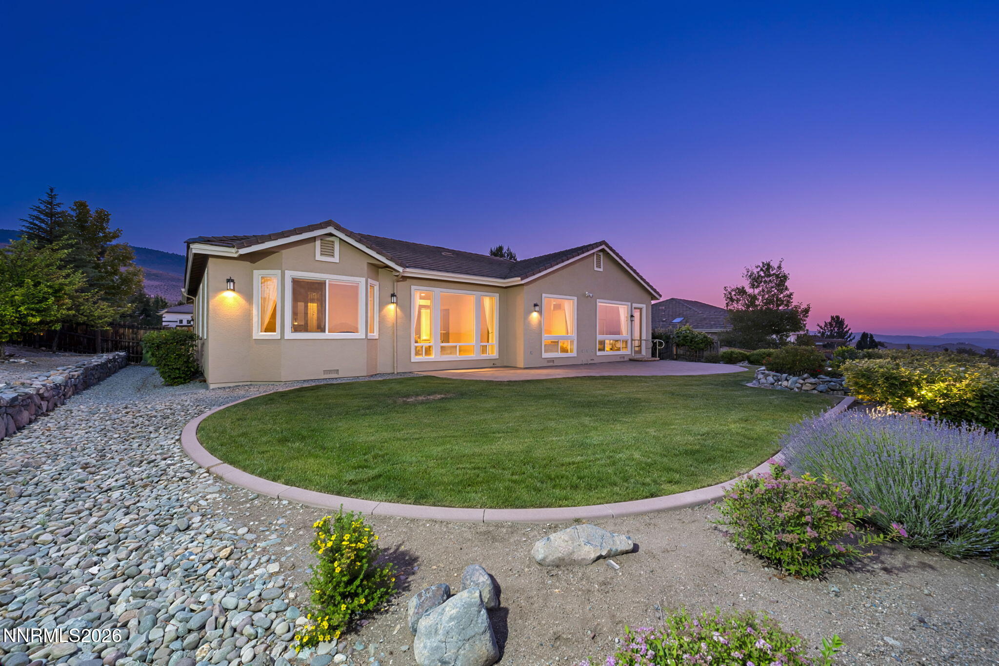 574 Echo Ridge Court Reno, NV 89511 - Photo 12 of 58 a view of a house with a yard
