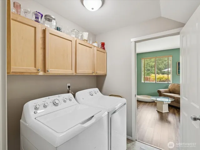 a utility room with dryer and washer