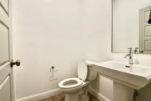 a bathroom with a sink and a toilet
