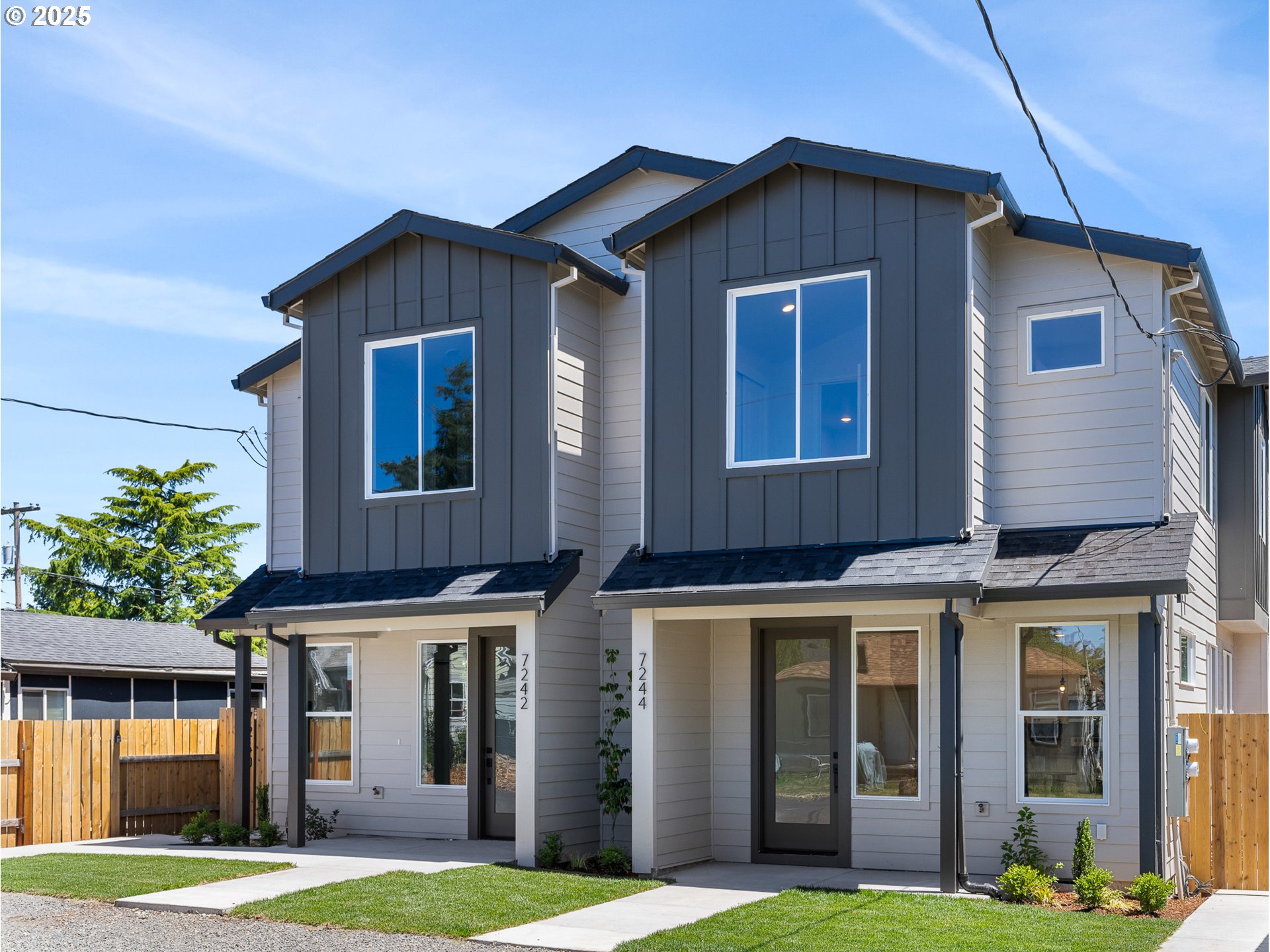 7242 Southeast 78th Avenue, Unit 1 Portland, OR 97206 - Photo 1 of 16 a front view of a house with garden