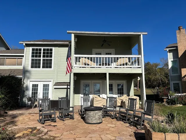 a view of a house with sitting area