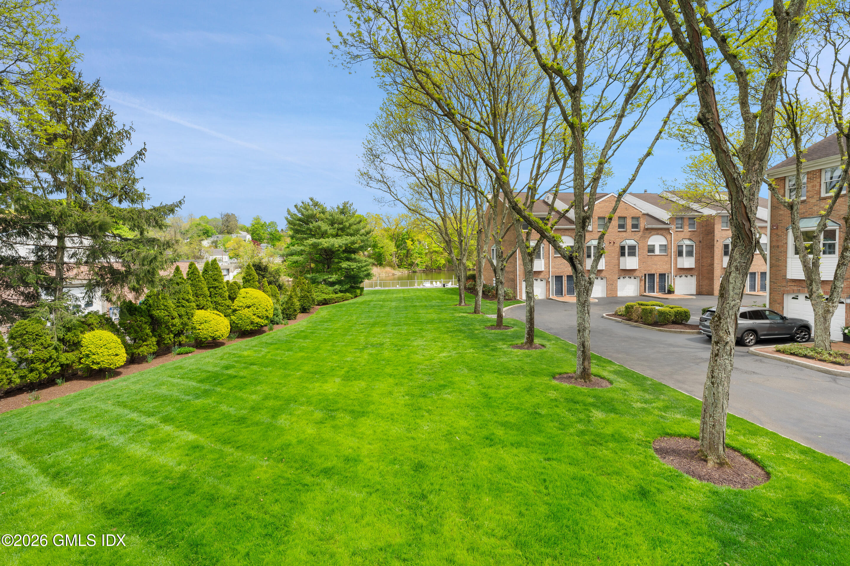 115 River Road, Unit 3 Cos Cob, CT 06807 - Photo 33 of 40 a view of a park with a tree