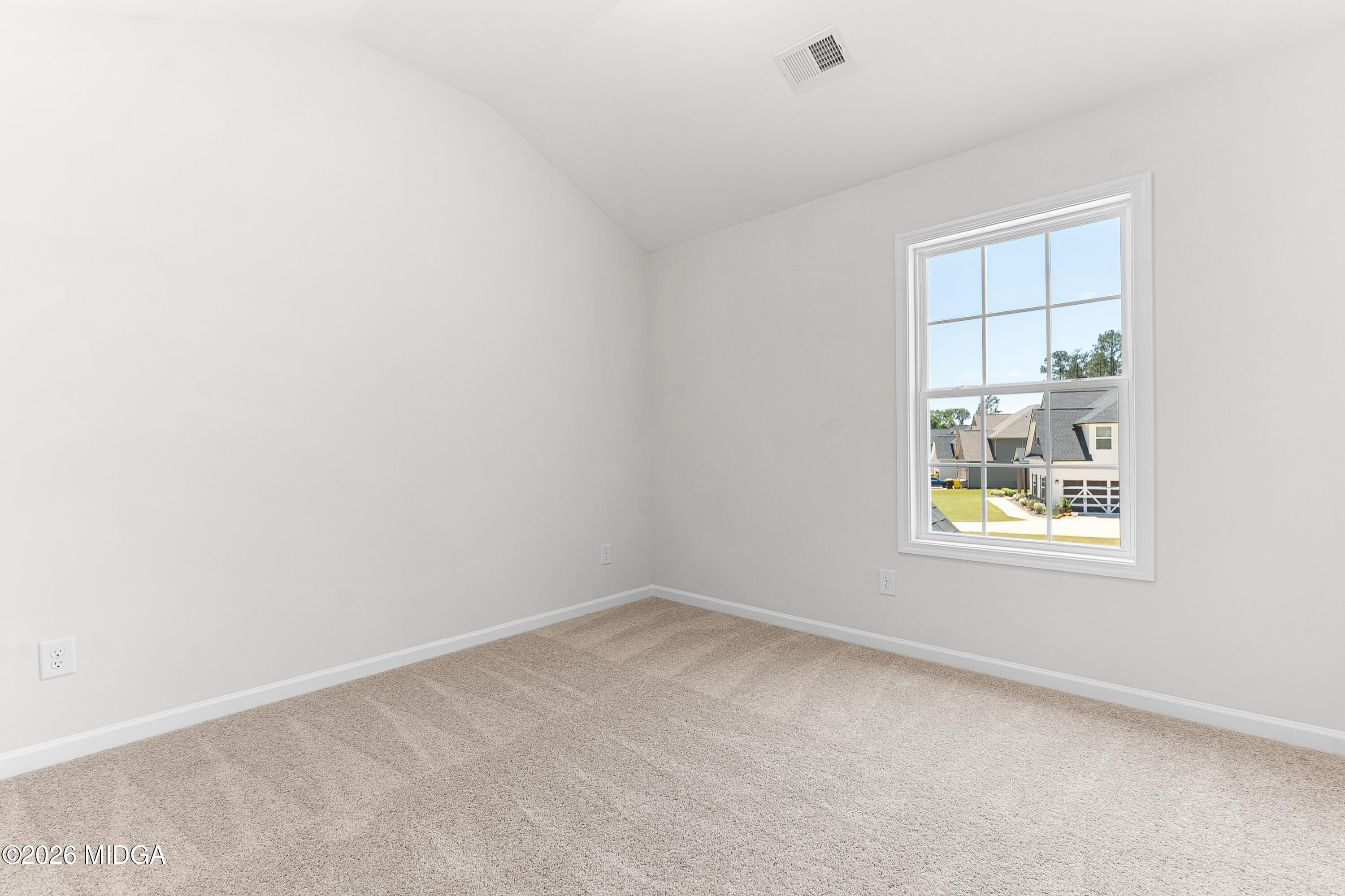 5393 Felles Way, Unit 359 Forsyth, GA 31029 - Photo 44 of 54 an empty room with a window
