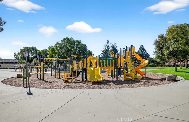 a view of swimming pool with seating space