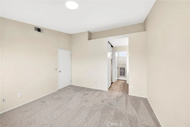 an empty room with an entryway