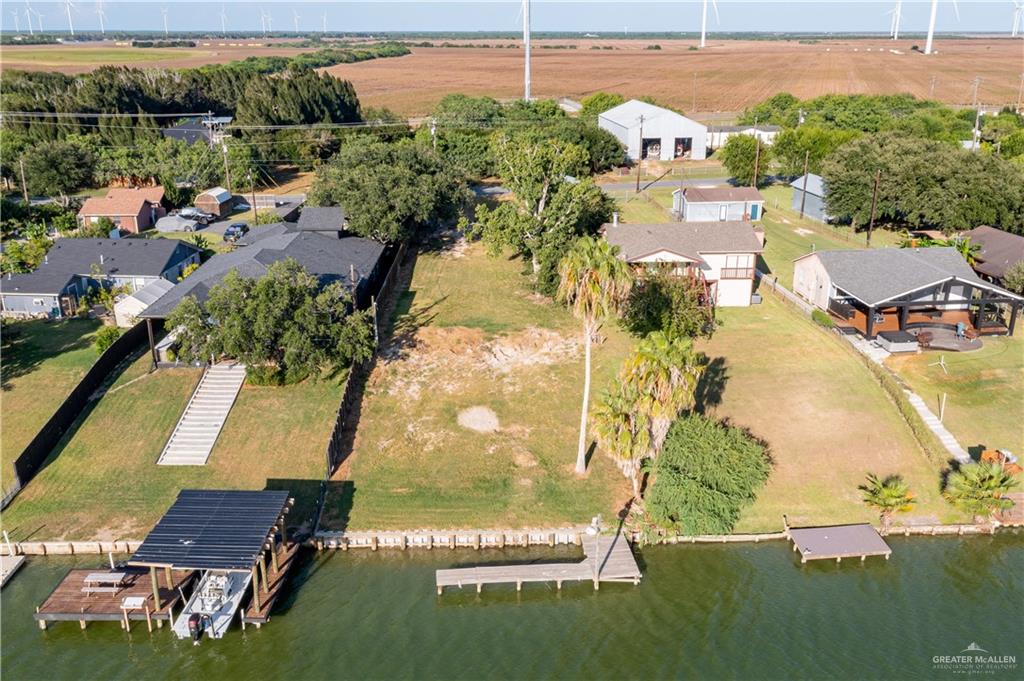 16116 Old Arroyo Circle Rio Hondo, TX 78583 - Photo 5 of 5 an aerial view of residential houses with outdoor space and swimming pool