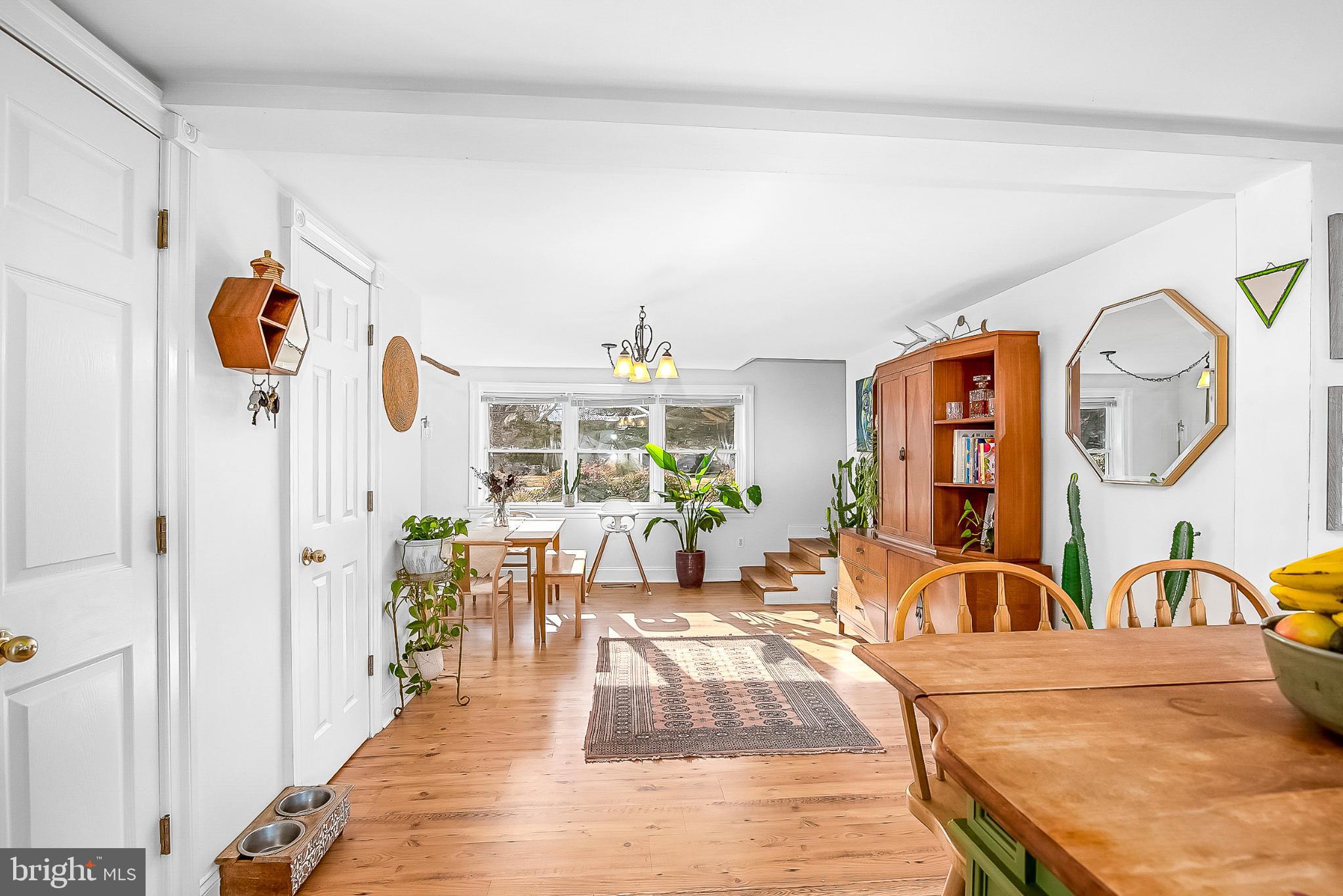 22582 Pot Pie Road Wittman, MD 21676 - Photo 13 of 36 a living room with furniture and a large window