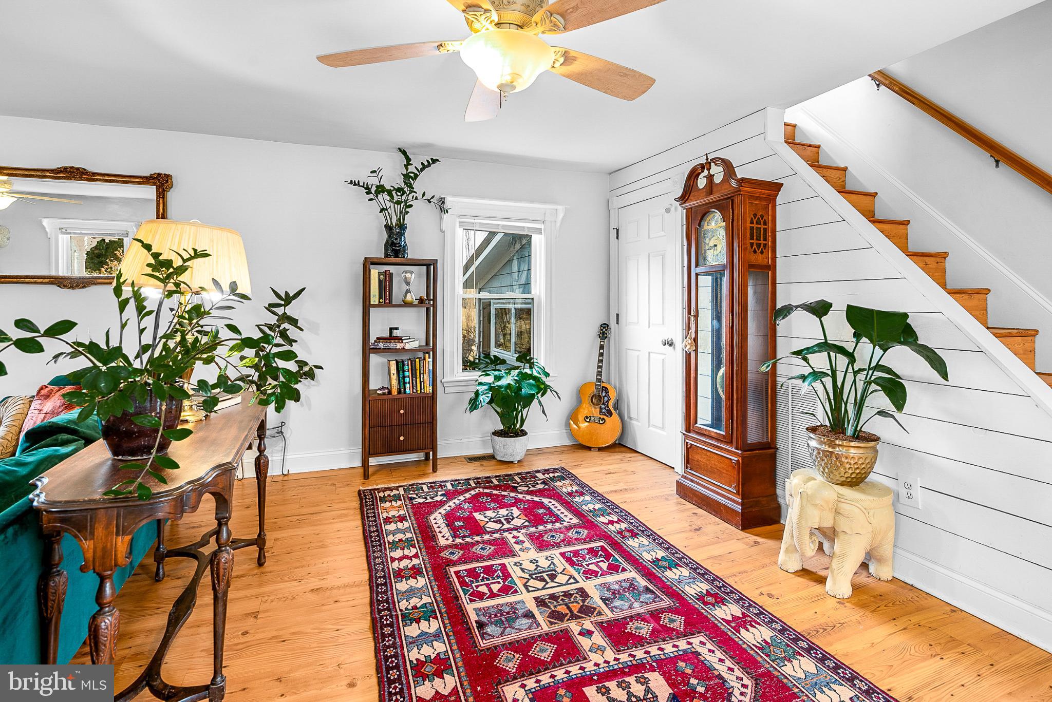 22582 Pot Pie Road Wittman, MD 21676 - Photo 10 of 36 a living room with furniture and a potted plant
