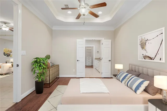a living room with furniture and potted plant
