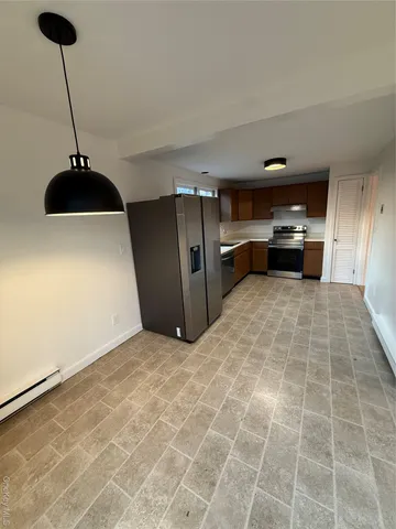 a view of a livingroom with a furniture