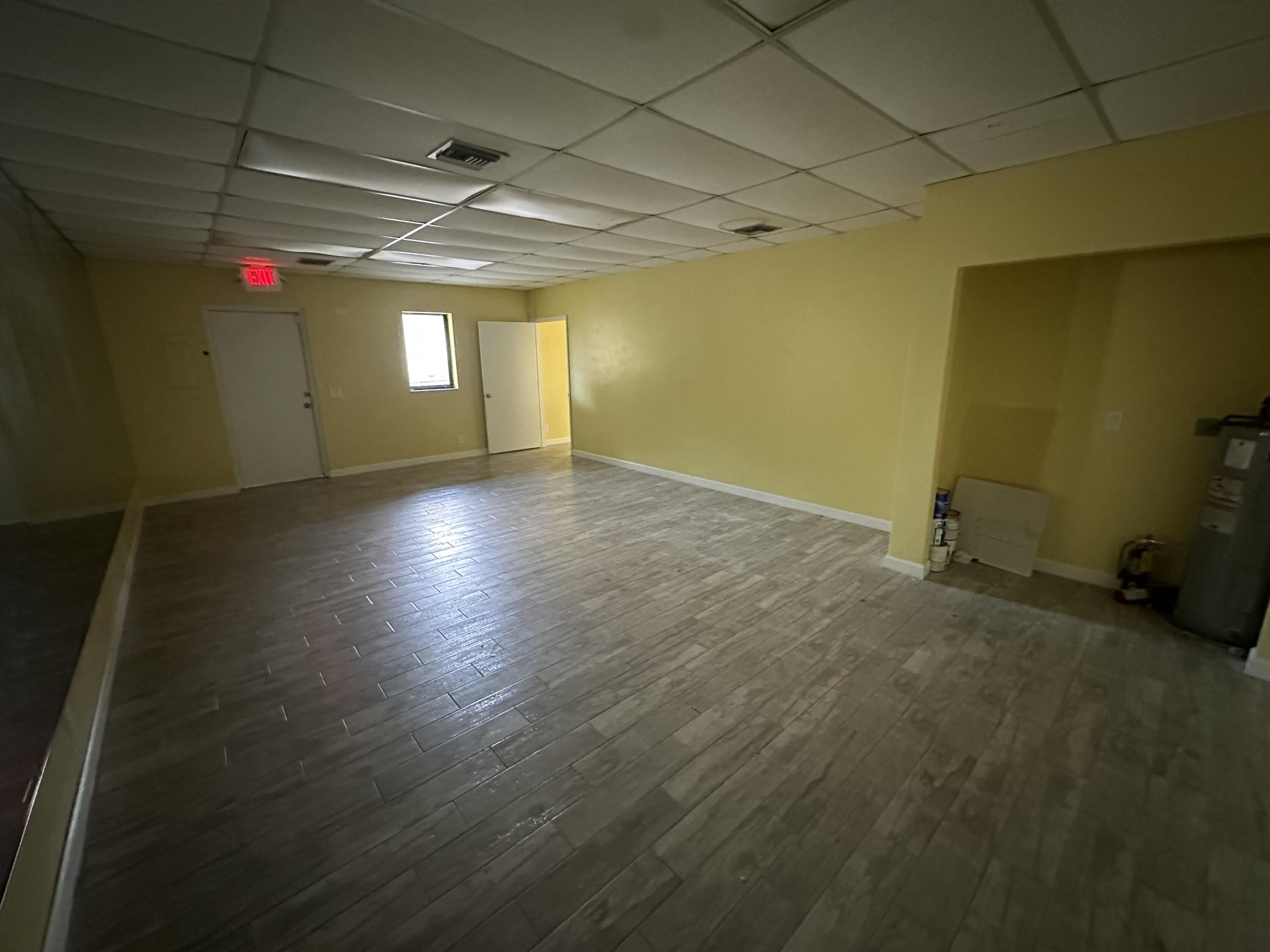 705 Park Avenue, Unit A Lake Park, FL 33403 - Photo 14 of 28 a view of hallway with a window