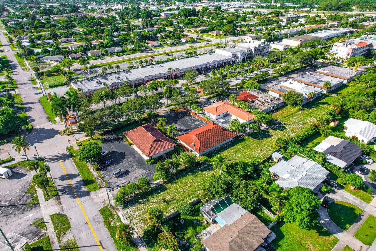 705 Park Avenue, Unit A Lake Park, FL 33403 - Photo 17 of 28 an aerial view of a house with a yard