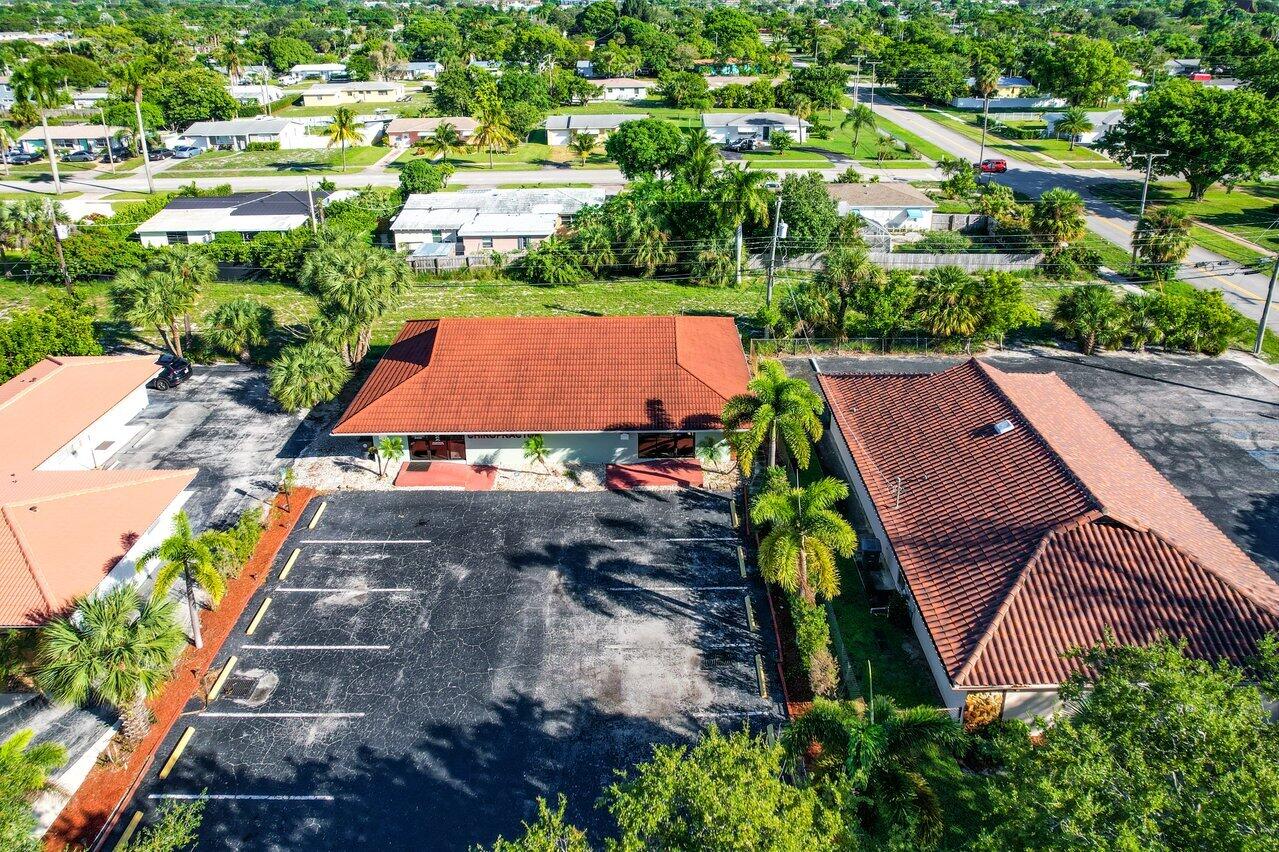 705 Park Avenue, Unit A Lake Park, FL 33403 - Photo 18 of 28 an aerial view of residential houses with outdoor space