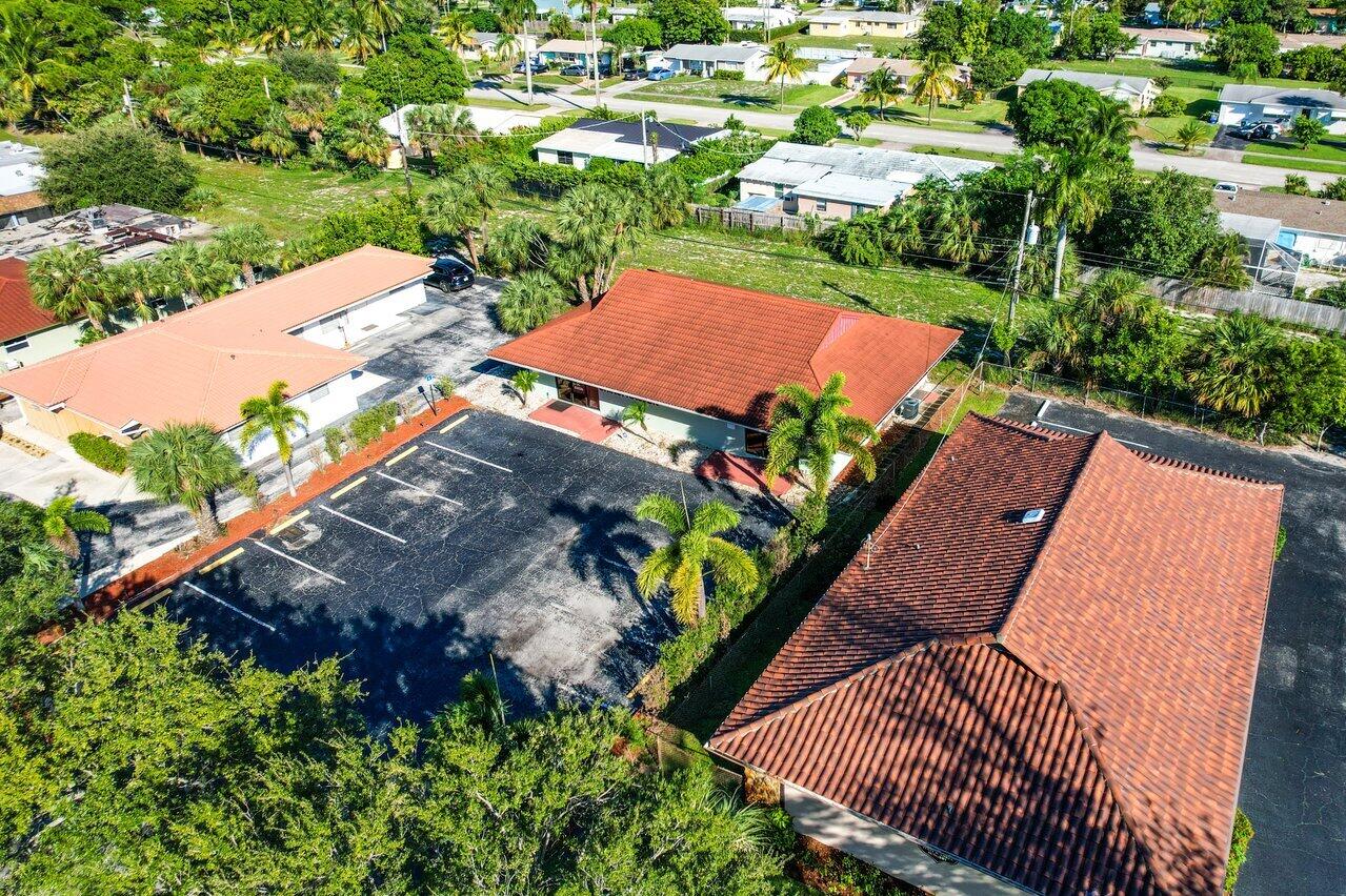 705 Park Avenue, Unit A Lake Park, FL 33403 - Photo 19 of 28 an aerial view of a house with garden space and street view