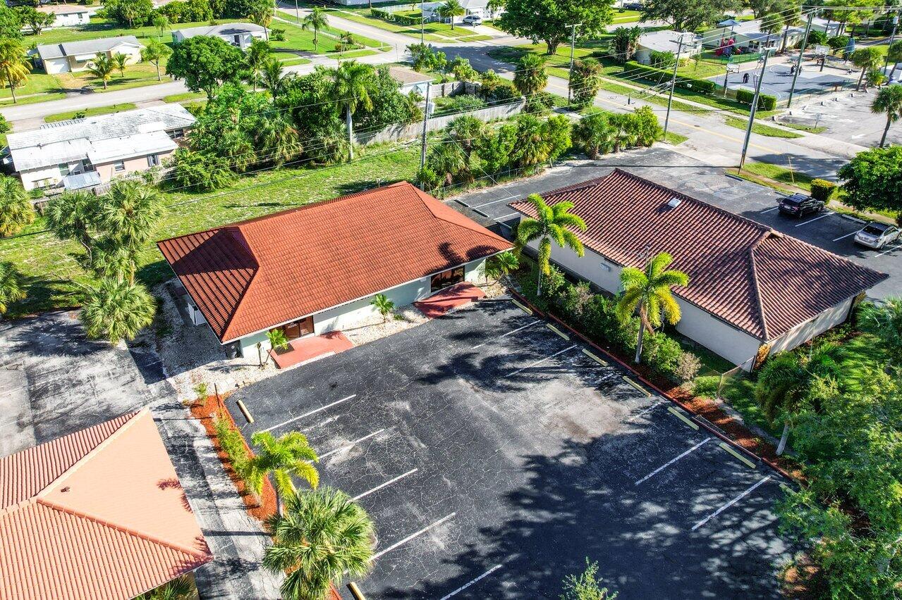 705 Park Avenue, Unit A Lake Park, FL 33403 - Photo 20 of 28 an aerial view of a house with a yard