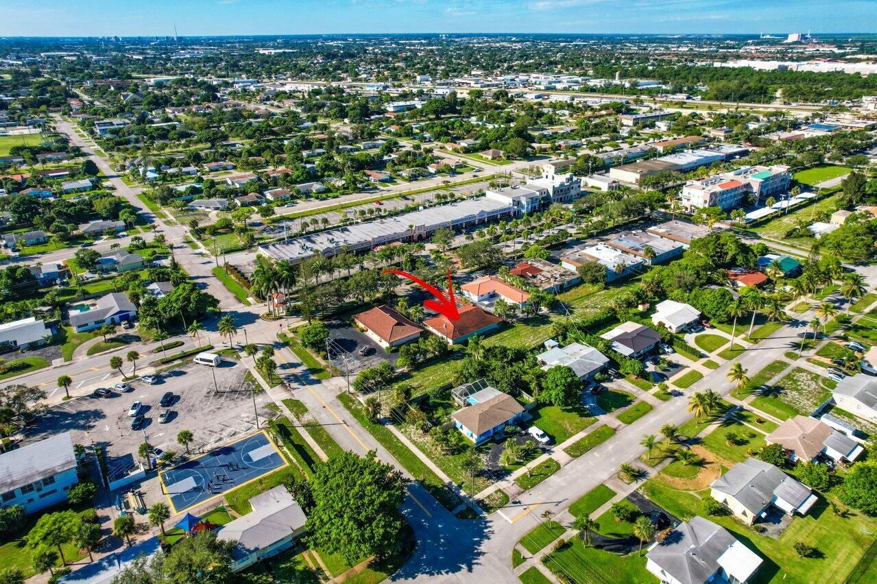 705 Park Avenue, Unit A Lake Park, FL 33403 - Photo 27 of 28 an aerial view of multiple house