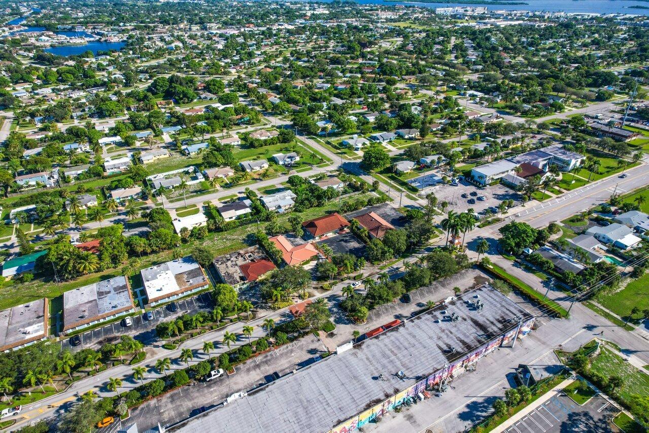 705 Park Avenue, Unit A Lake Park, FL 33403 - Photo 28 of 28 an aerial view of residential houses with outdoor space