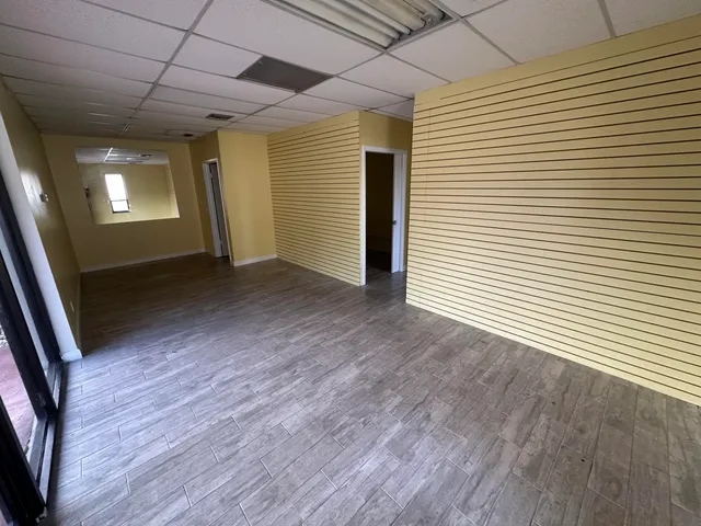 a view of an empty room with a window