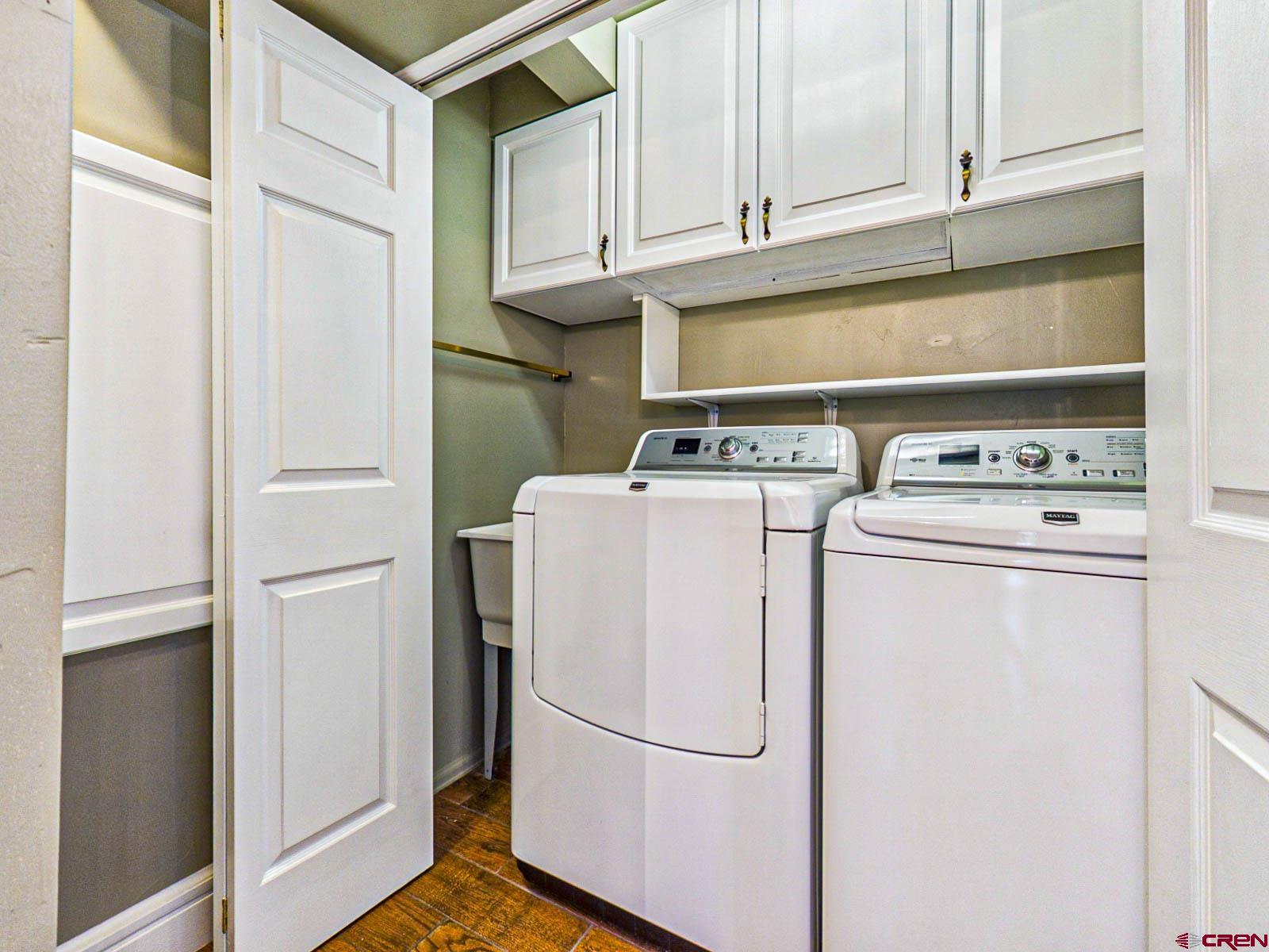 16331 2550th Road Cedaredge, CO 81413 - Photo 30 of 45 a utility room with dryer and washer