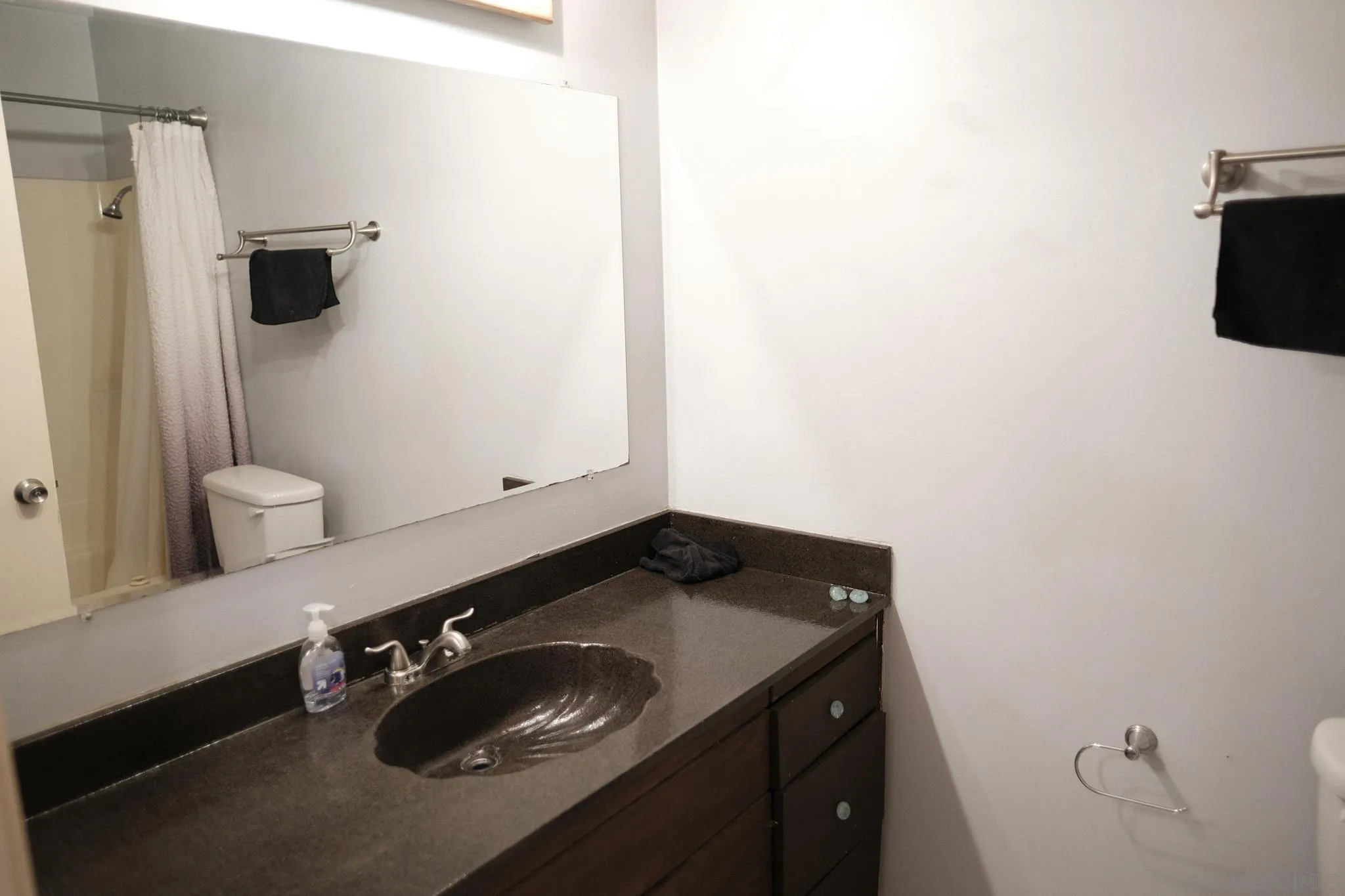 2142 Ridgeview Place Escondido, CA 92026 - Photo 15 of 29 a bathroom with a sink and a toilet