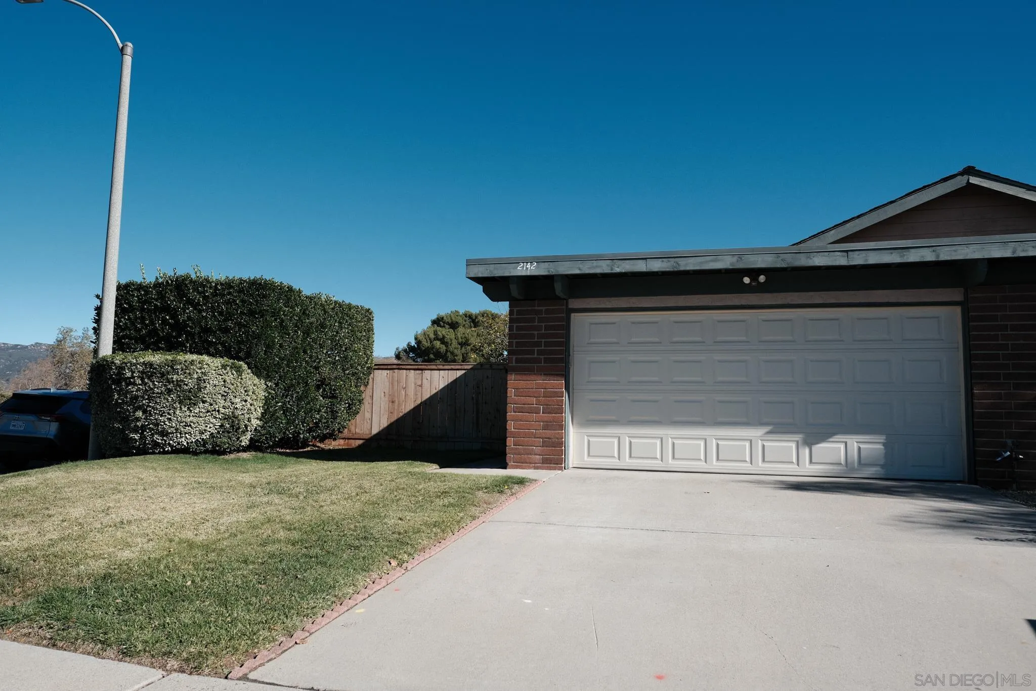 2142 Ridgeview Place Escondido, CA 92026 - Photo 2 of 29 a view of a house with a yard