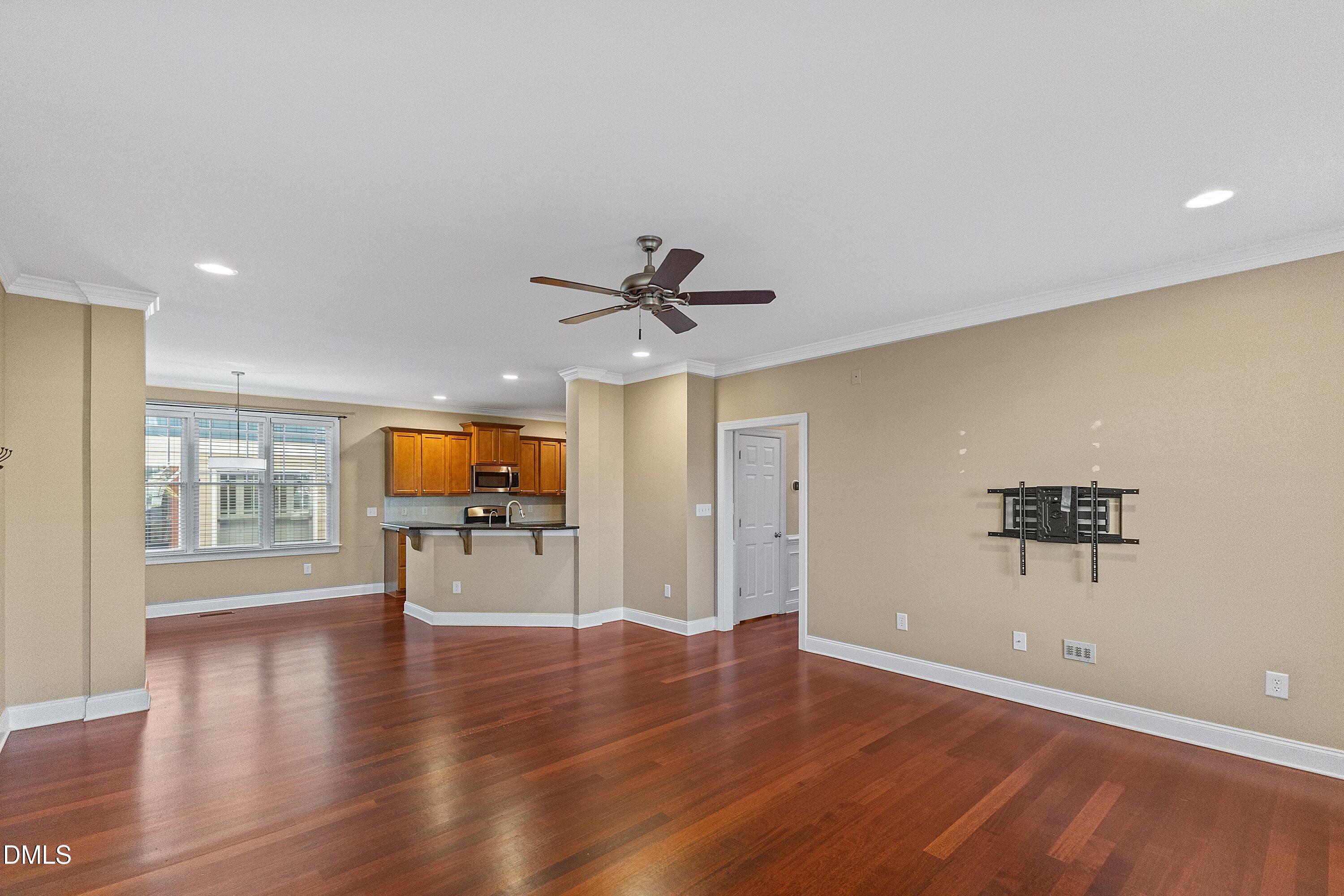 2124 Karns Place Raleigh, NC 27614 - Photo 28 of 74 a view of empty room with wooden floor and window