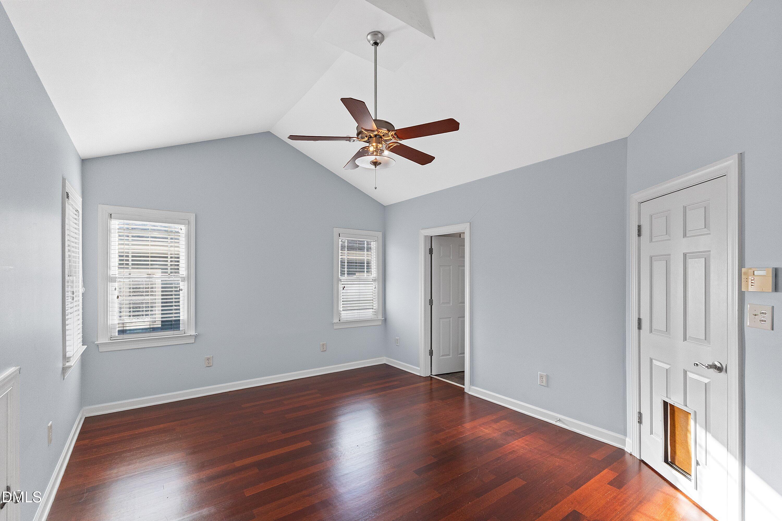 2124 Karns Place Raleigh, NC 27614 - Photo 35 of 74 an empty room with wooden floor and ceiling fan