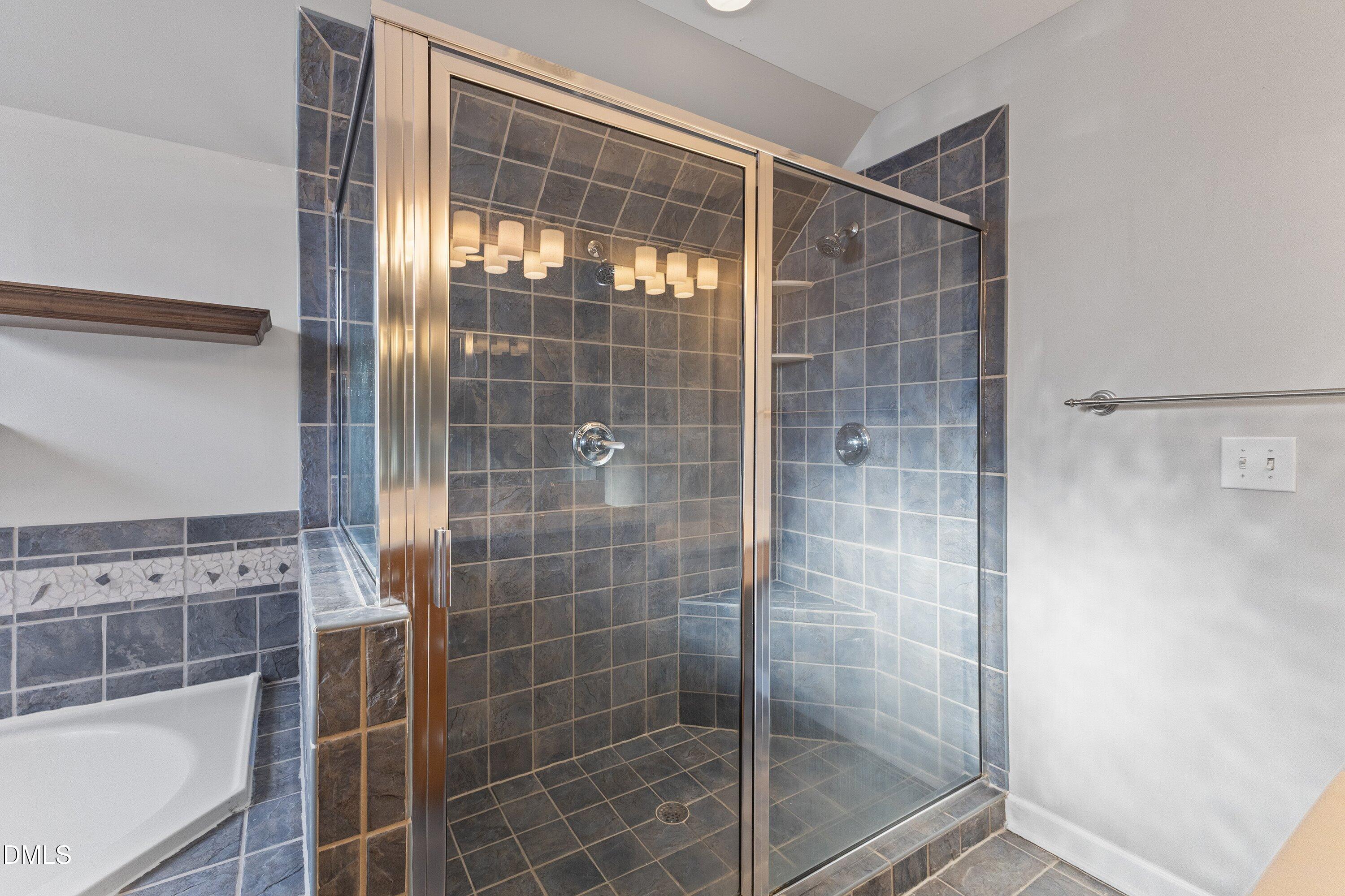 2124 Karns Place Raleigh, NC 27614 - Photo 40 of 74 a bathroom with a shower and a sink