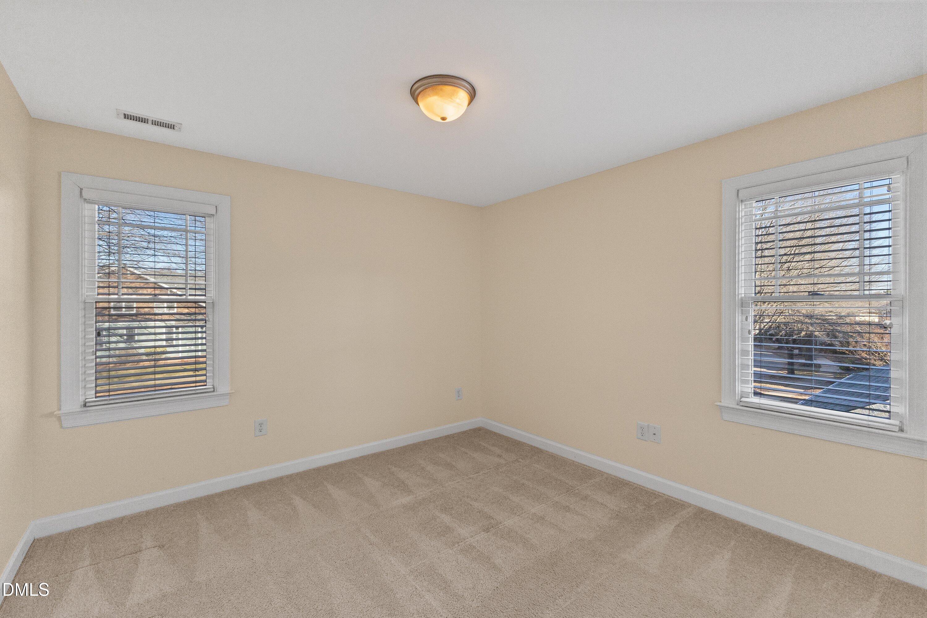 2124 Karns Place Raleigh, NC 27614 - Photo 44 of 74 a view of an empty room with a window