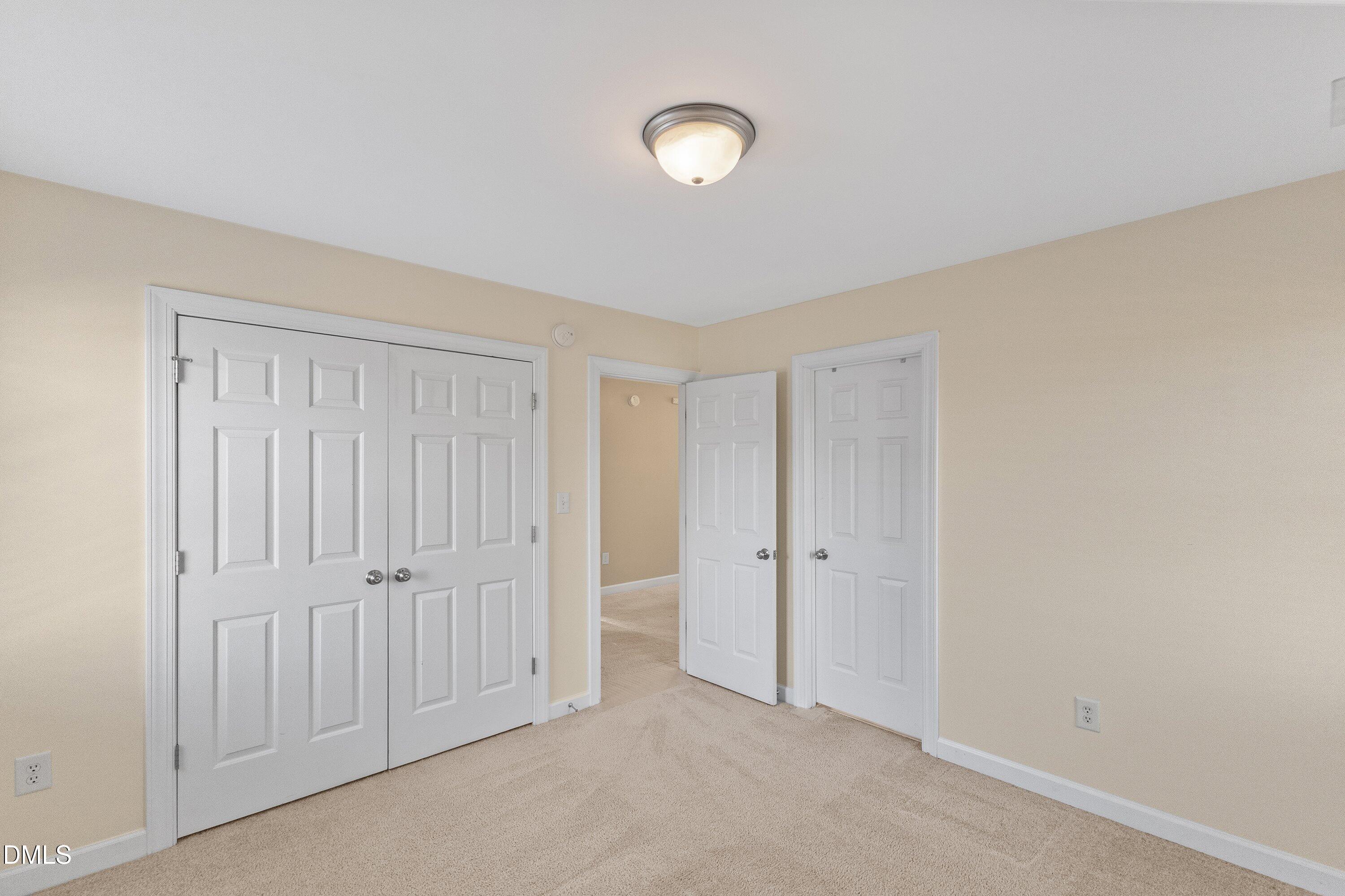 2124 Karns Place Raleigh, NC 27614 - Photo 45 of 74 a view of an empty room with closet area
