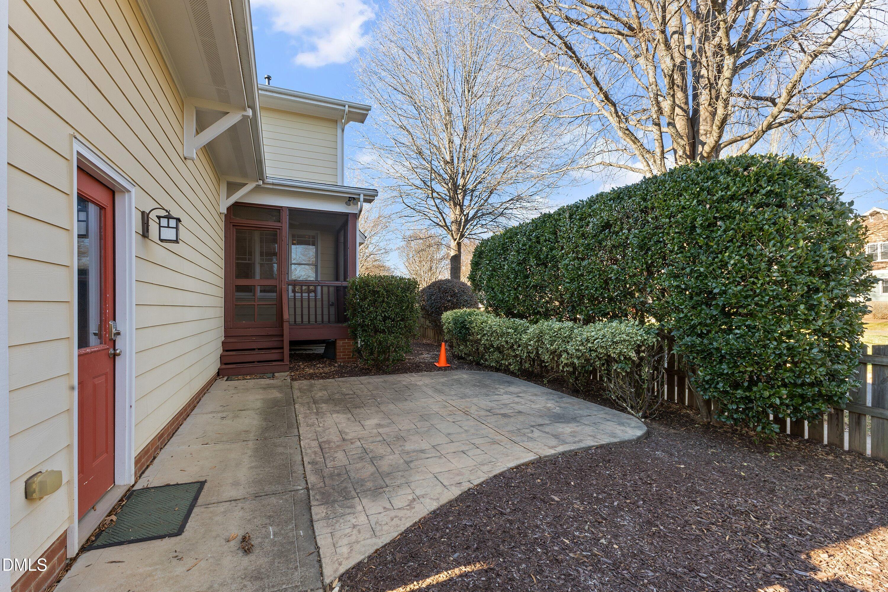 2124 Karns Place Raleigh, NC 27614 - Photo 50 of 74 a view of a house with a yard and potted plants