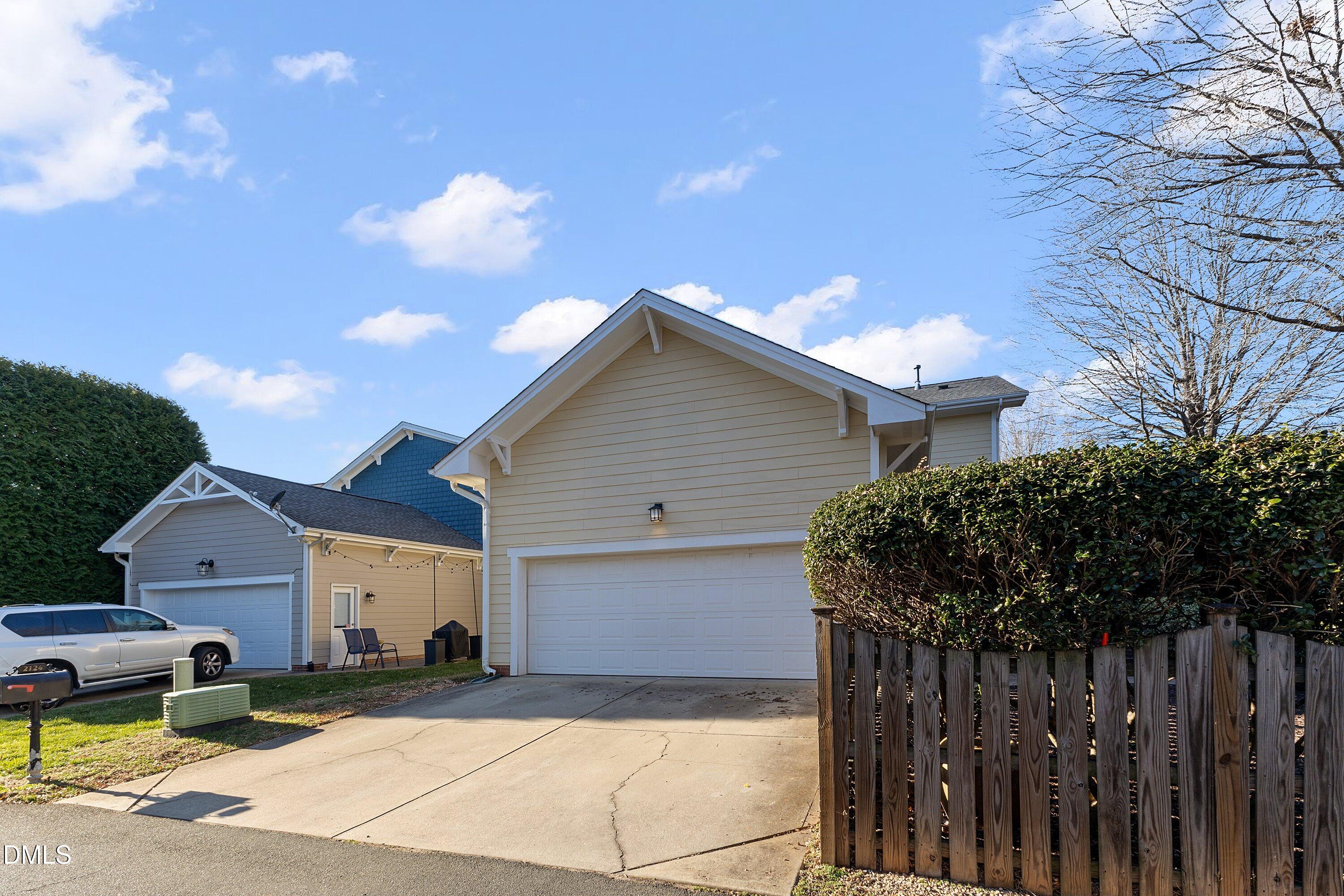 2124 Karns Place Raleigh, NC 27614 - Photo 55 of 74 a front view of house with yard and trees in the background