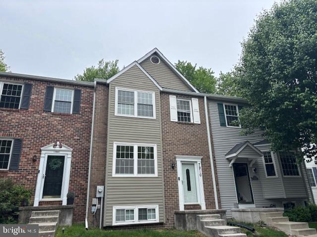 7910 Della Rosa Court Pasadena, MD 21122 - Photo 1 of 15 Brick front home backs to woods